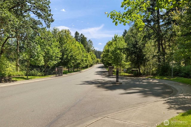 502 182nd St E, Spanaway, WA 98387 - view of asphalt street featuring curbs