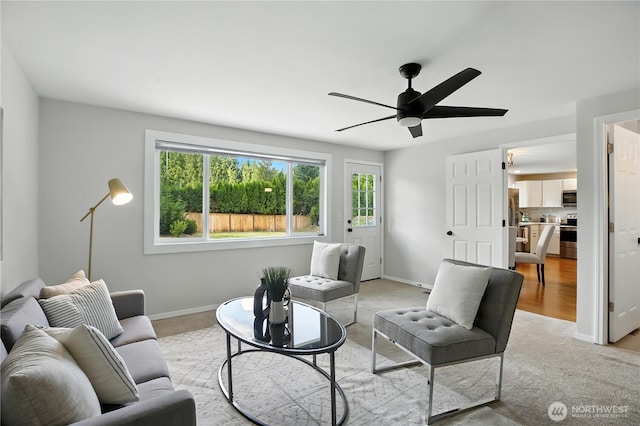 18844 SE 214th St, Renton, WA 98058 - living area with ceiling fan and baseboards