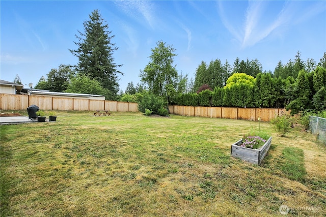 18844 SE 214th St, Renton, WA 98058 - fenced backyard featuring a garden