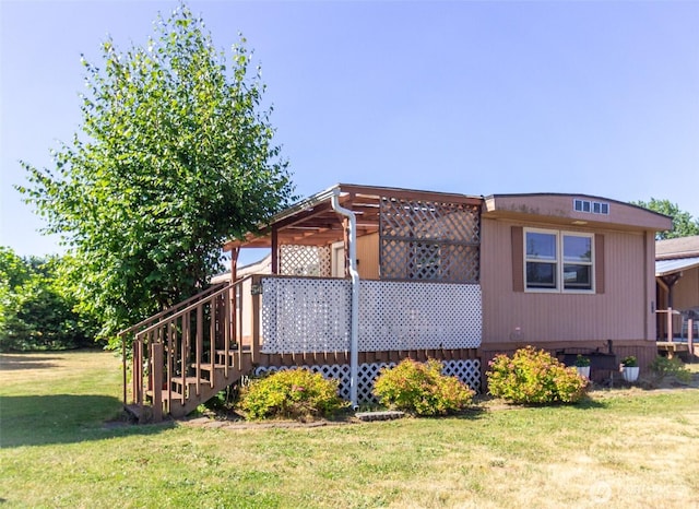 838 W Axton Rd Unit 54, Bellingham, WA 98226 - view of side of property with a yard