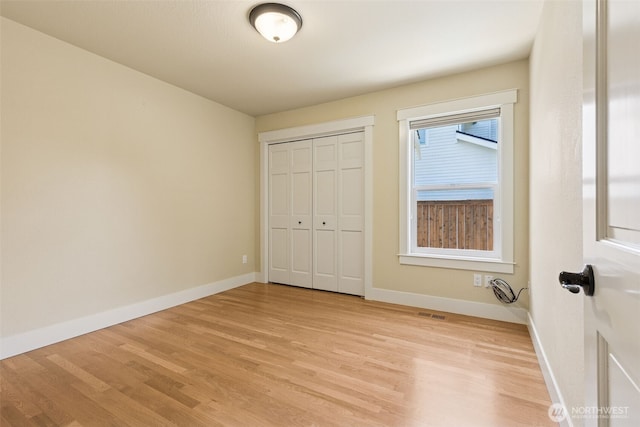 4101 Banbridge Loop SE, Olympia, WA 98501 - unfurnished bedroom with light wood-style floors and a closet