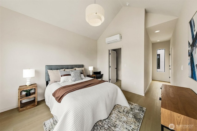 8733 13th Ave NW Unit A, Seattle, WA 98117 - bedroom featuring a wall mounted AC, light wood-style floors, high vaulted ceiling, and recessed lighting