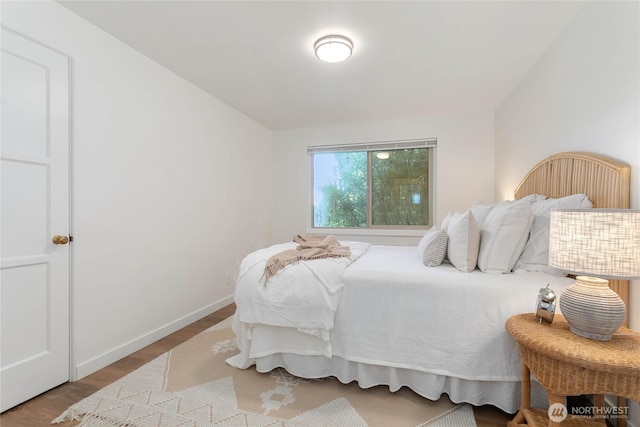 901 N Forest St Unit 146, Bellingham, WA 98225 - bedroom with wood finished floors and baseboards