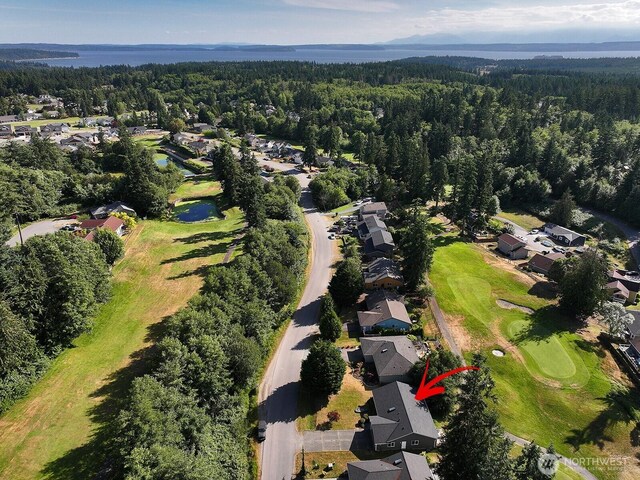 4896 Spinnaker Dr, Freeland, WA 98249 - aerial view of property and surrounding area with a golf course and nearby suburban area