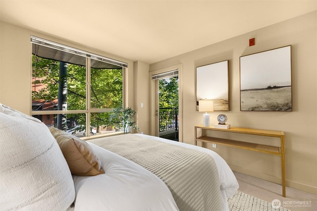 1420 E Pine St Unit E203, Seattle, WA 98122 - bedroom with access to exterior and baseboards