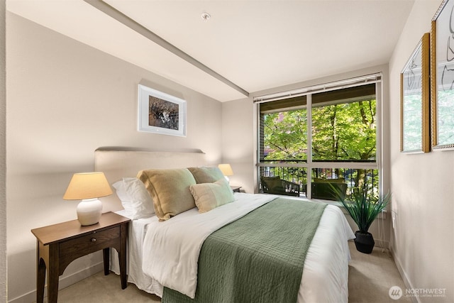 1420 E Pine St Unit E203, Seattle, WA 98122 - bedroom featuring carpet flooring and baseboards