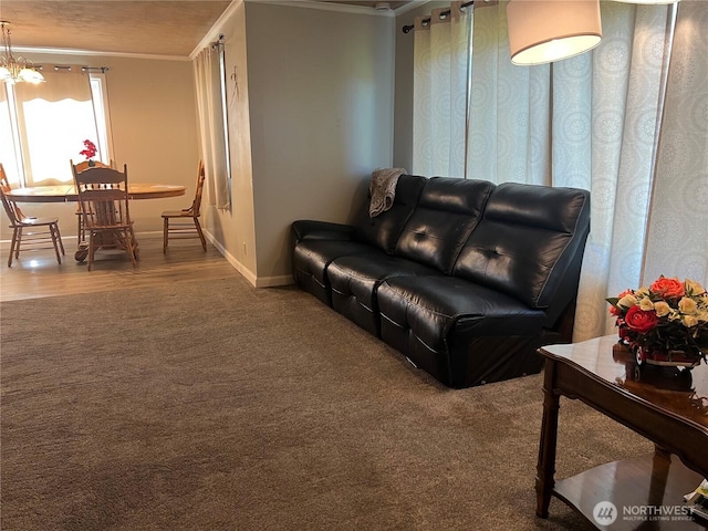 1717 Cherry St, Aberdeen, WA 98520 - living area featuring ornamental molding, carpet floors, and a chandelier