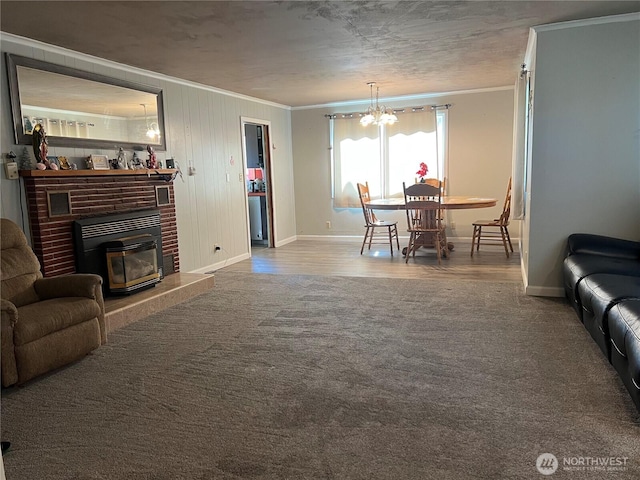 1717 Cherry St, Aberdeen, WA 98520 - living area featuring crown molding, carpet, a chandelier, and wood finished floors