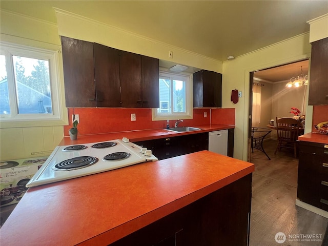 1717 Cherry St, Aberdeen, WA 98520 - kitchen featuring ornamental molding, white appliances, dark brown cabinets, and a chandelier