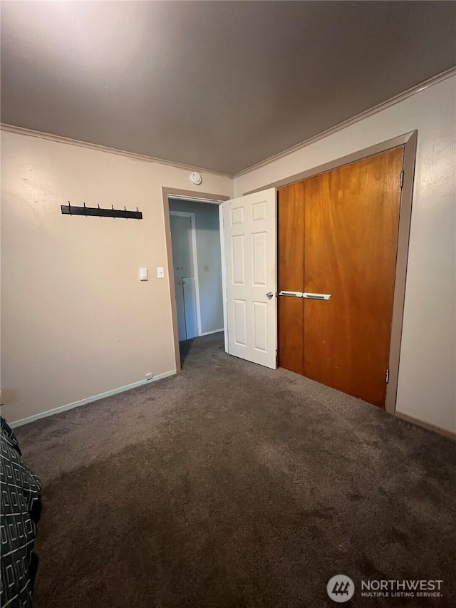 1717 Cherry St, Aberdeen, WA 98520 - unfurnished bedroom with dark colored carpet and baseboards
