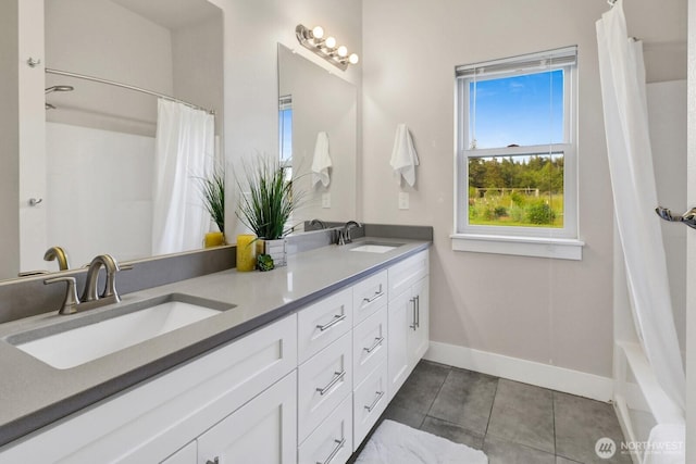5754 W 26th Crst, Ferndale, WA 98248 - full bath with double vanity, tile patterned flooring, and shower / bath combination with curtain
