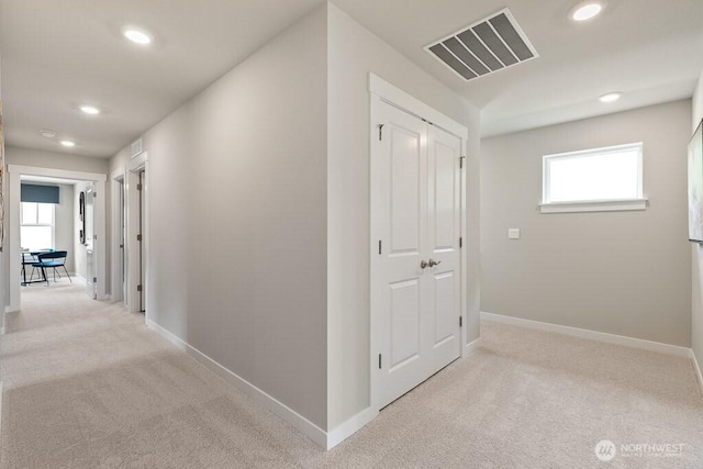 821 SE 12th Pl Unit 31, North Bend, WA 98045 - hallway featuring light carpet, recessed lighting, and plenty of natural light