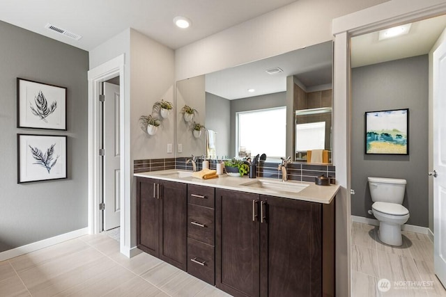 821 SE 12th Pl Unit 31, North Bend, WA 98045 - bathroom with double vanity and a shower