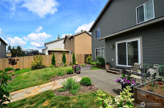 27719 NE 146th Way, Duvall, WA 98019 - rear view of house with a patio area and a garden