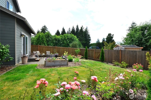 27719 NE 146th Way, Duvall, WA 98019 - fenced backyard featuring a vegetable garden