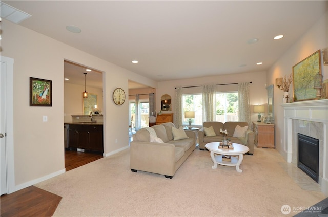 27719 NE 146th Way, Duvall, WA 98019 - living room featuring carpet, recessed lighting, and a high end fireplace