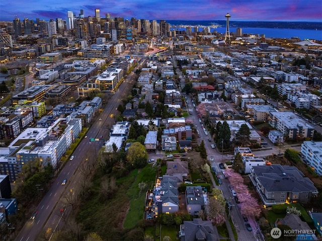 1416 6th Ave N, Seattle, WA 98109 - aerial view of property and surrounding area featuring nearby urban area and a large body of water
