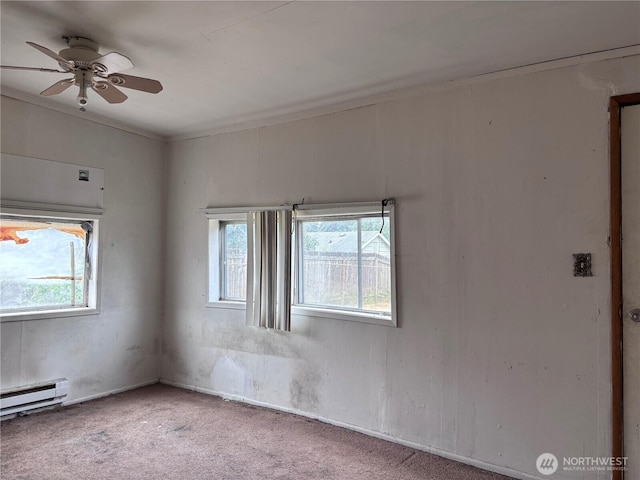 8020 S D St, Tacoma, WA 98408 - carpeted spare room featuring plenty of natural light, ceiling fan, a baseboard heating unit, and crown molding