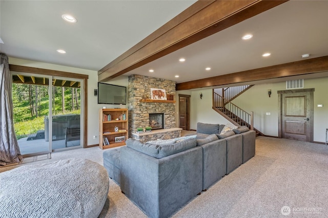 239 Foxridge Ln, Leavenworth, WA 98826 - living room featuring carpet flooring, beamed ceiling, stairs, a stone fireplace, and recessed lighting