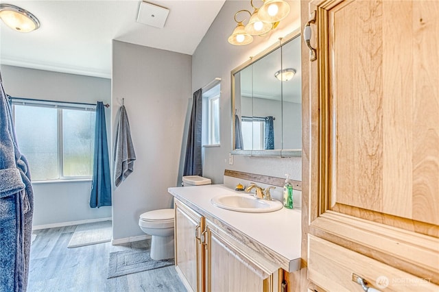 1630 Pleasant Ave Unit 21, Wenatchee, WA 98801 - bathroom with healthy amount of natural light, vanity, and wood finished floors
