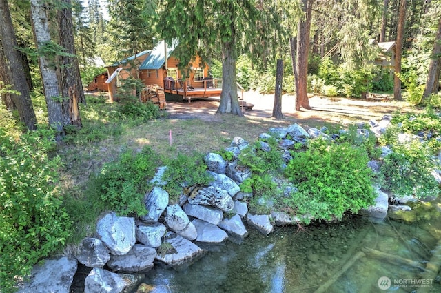 13990 Brae Burn Rd, Leavenworth, WA 98826 - view of yard with a deck and a forest view