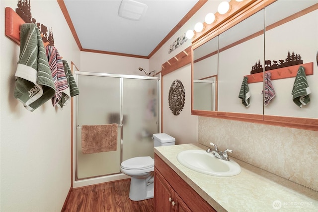 2115 Chiwawa Ct, Leavenworth, WA 98826 - full bathroom featuring crown molding, wood finished floors, a shower stall, and vanity