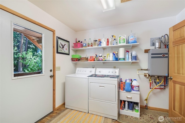 2115 Chiwawa Ct, Leavenworth, WA 98826 - laundry area with independent washer and dryer, tankless water heater, and light wood-style flooring