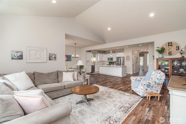 10 Coyote Rd, Montesano, WA 98563 - living area with a chandelier, dark wood-style flooring, recessed lighting, and high vaulted ceiling