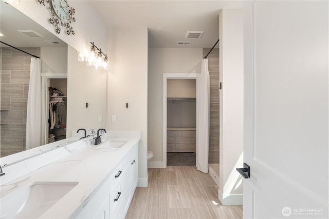 10 Coyote Rd, Montesano, WA 98563 - full bath with a walk in closet, a stall shower, and double vanity