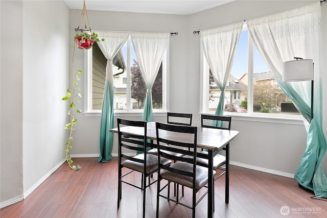 17915 25th Ave E, Tacoma, WA 98445 - dining room featuring healthy amount of natural light and wood finished floors