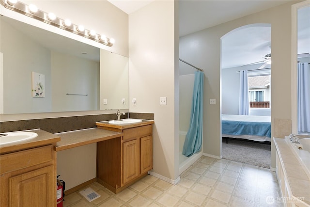 17915 25th Ave E, Tacoma, WA 98445 - ensuite bathroom featuring a bath, double vanity, tile patterned floors, and a shower with shower curtain