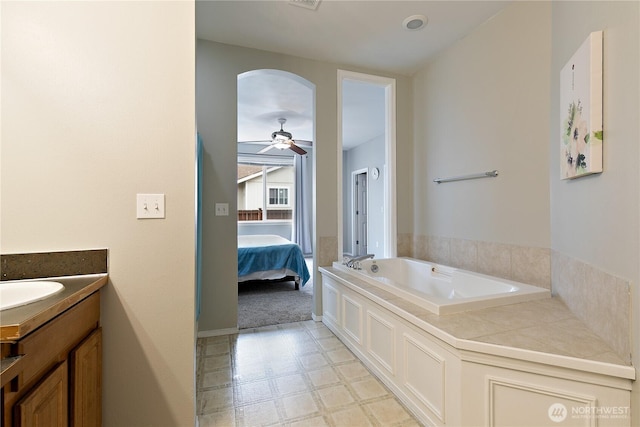 17915 25th Ave E, Tacoma, WA 98445 - full bathroom featuring tile patterned floors, a garden tub, vanity, ceiling fan, and ensuite bathroom