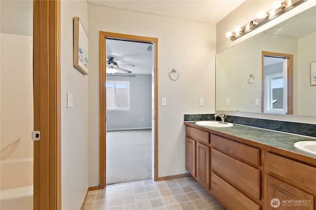 17915 25th Ave E, Tacoma, WA 98445 - full bath with double vanity and a ceiling fan