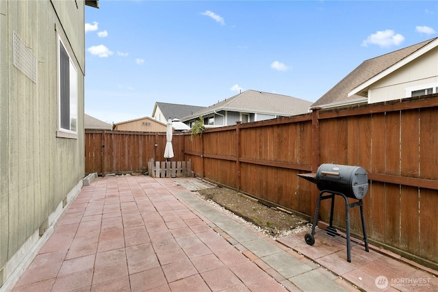 17915 25th Ave E, Tacoma, WA 98445 - fenced backyard with a patio area and grilling area