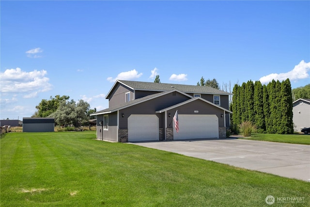 11389 Thompson Rd NE, Moses Lake, WA 98837 - view of front of home featuring a front yard, driveway, a garage, and stone siding