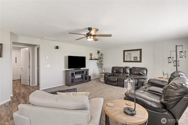 11389 Thompson Rd NE, Moses Lake, WA 98837 - living area featuring ceiling fan and baseboards