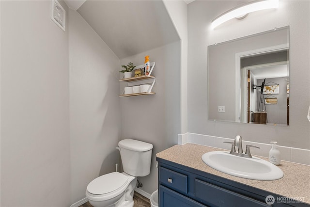 11389 Thompson Rd NE, Moses Lake, WA 98837 - half bathroom with vanity and lofted ceiling
