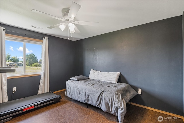 11389 Thompson Rd NE, Moses Lake, WA 98837 - bedroom featuring baseboards and a ceiling fan