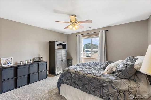 11389 Thompson Rd NE, Moses Lake, WA 98837 - bedroom featuring light colored carpet and ceiling fan