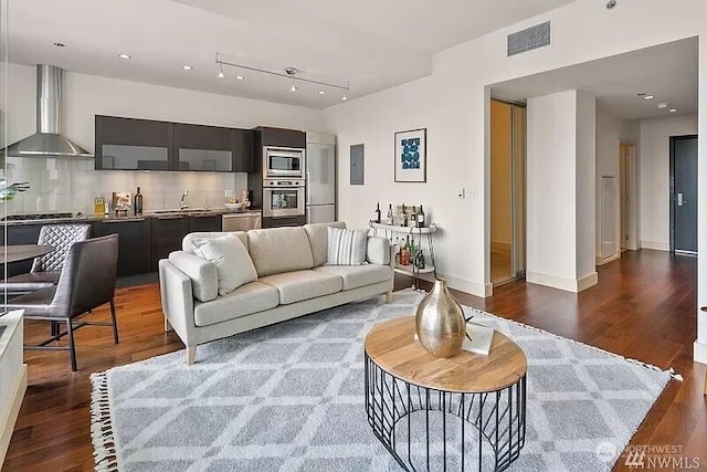 737 Olive Way Unit 3110, Seattle, WA 98101 - living area featuring wood finished floors and electric panel