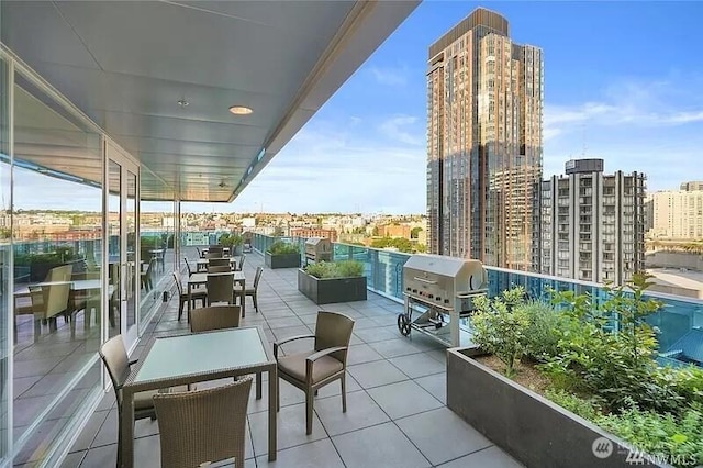 737 Olive Way Unit 3110, Seattle, WA 98101 - view of patio / terrace with a view of city and area for grilling