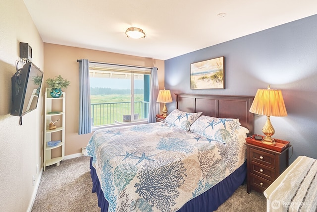 210 26th St NW Unit 428, Long Beach, WA 98631 - carpeted bedroom featuring baseboards