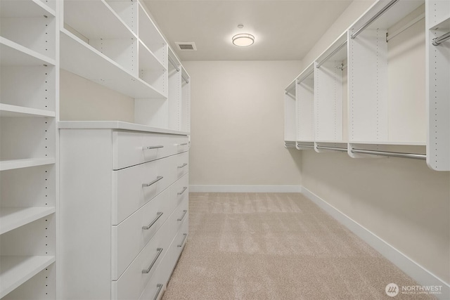 4719 86th Ave SE, Mercer Island, WA 98040 - walk in closet featuring light carpet