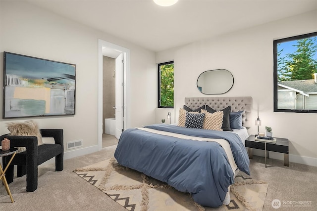 4719 86th Ave SE, Mercer Island, WA 98040 - carpeted bedroom with multiple windows and connected bathroom