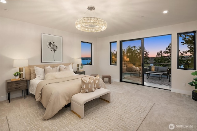 4719 86th Ave SE, Mercer Island, WA 98040 - bedroom with access to outside, a chandelier, light colored carpet, and recessed lighting