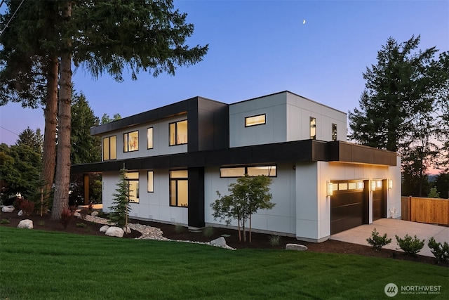 4719 86th Ave SE, Mercer Island, WA 98040 - view of front of house with driveway and a garage