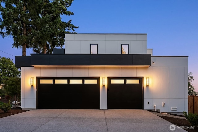 4719 86th Ave SE, Mercer Island, WA 98040 - contemporary home featuring concrete driveway and an attached garage