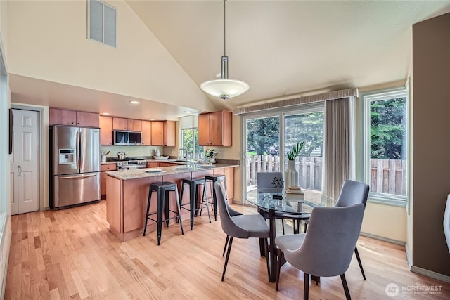 31451 48th Pl SW, Federal Way, WA 98023 - dining area with light wood-style floors and high vaulted ceiling