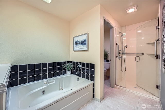 31451 48th Pl SW, Federal Way, WA 98023 - bathroom with a jetted tub, a stall shower, and tile patterned flooring