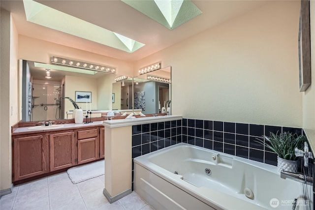 31451 48th Pl SW, Federal Way, WA 98023 - bathroom featuring a skylight, a tub with jets, tile patterned flooring, vanity, and a shower with shower door